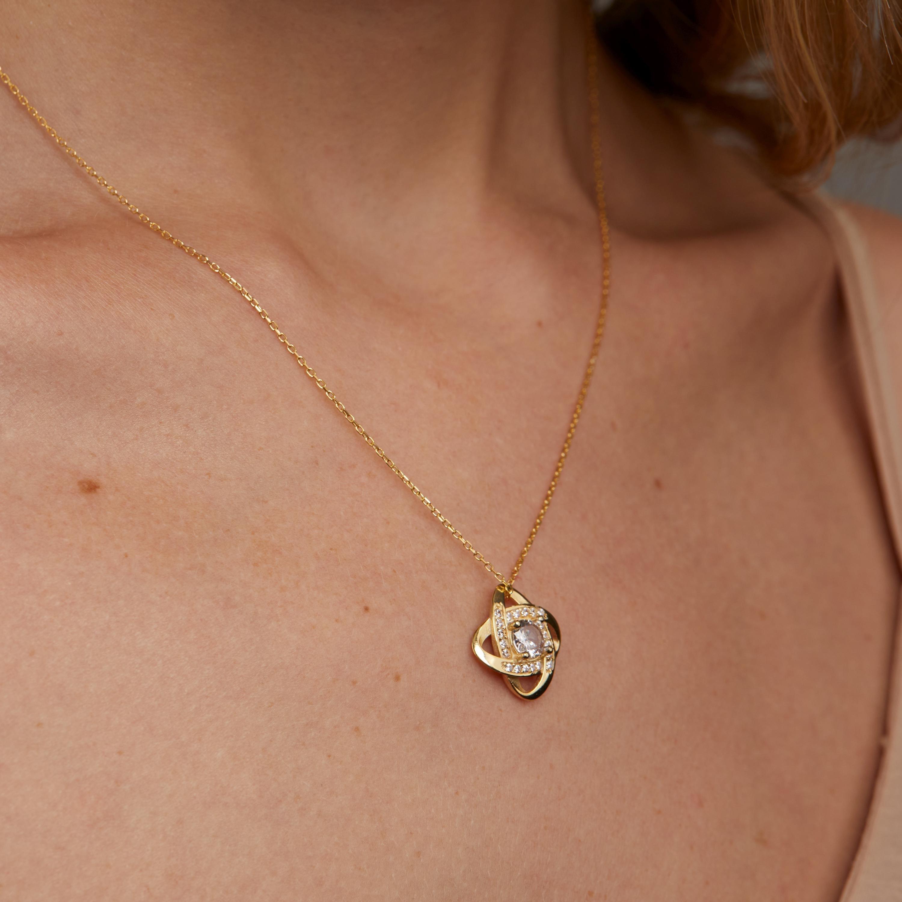 The Love Knot Necklace worn in 18K Gold Vermeil — refined accessory for women. Hypoallergenic, no green marks.