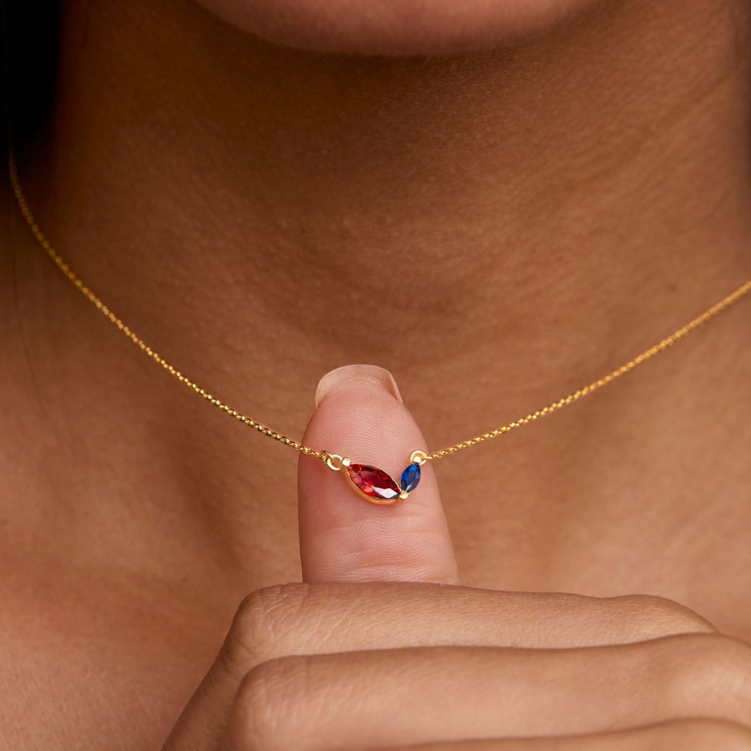 Macro detail of the Marquese Double Birthstone Necklace: Birthstone set in 18K Gold Vermeil. Tarnish-resistant, handmade.