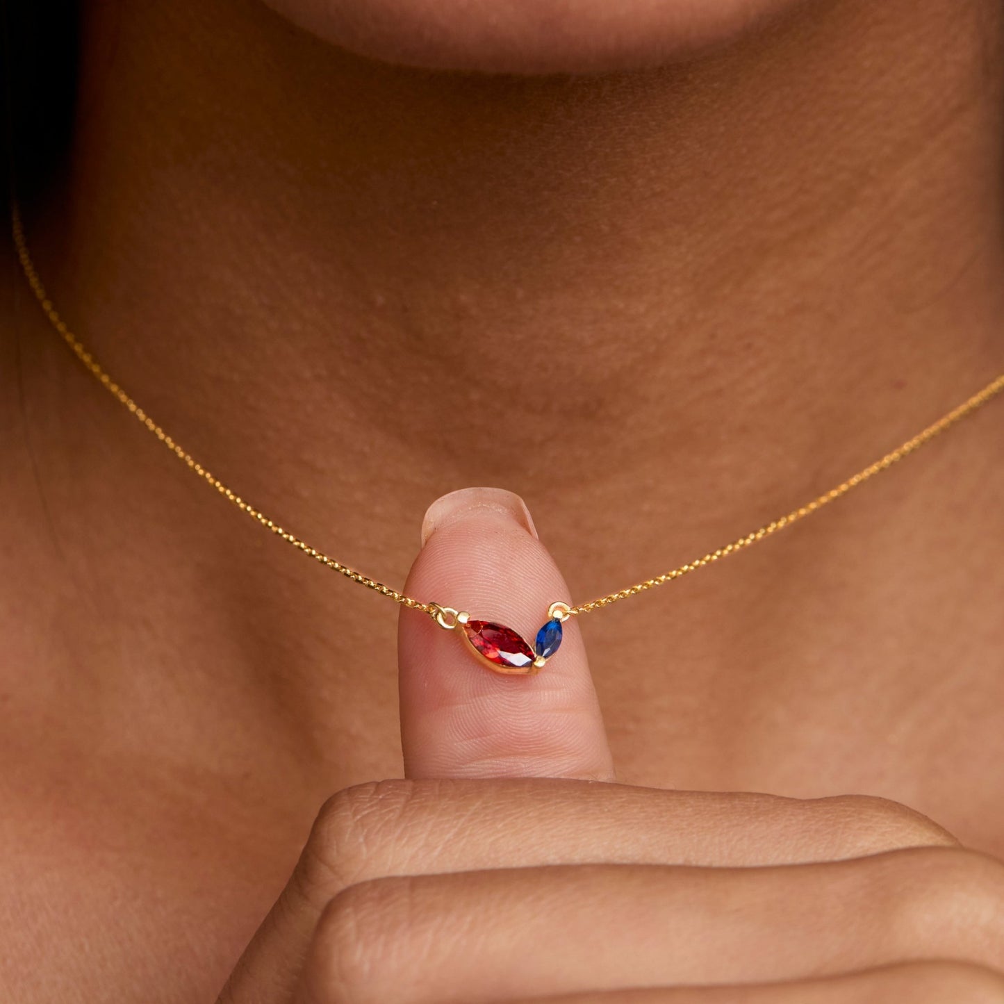 Macro detail of the Marquese Double Birthstone Necklace: Birthstone set in 18K Gold Vermeil. Tarnish-resistant, handmade.