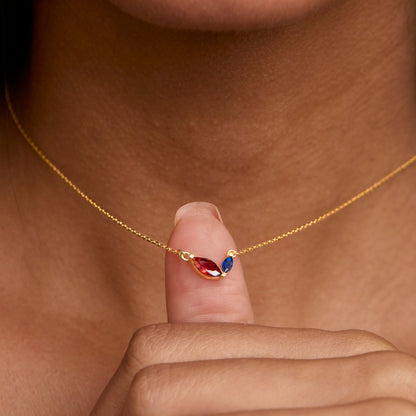 Macro detail of the Marquese Double Birthstone Necklace: Birthstone set in 18K Gold Vermeil. Tarnish-resistant, handmade.