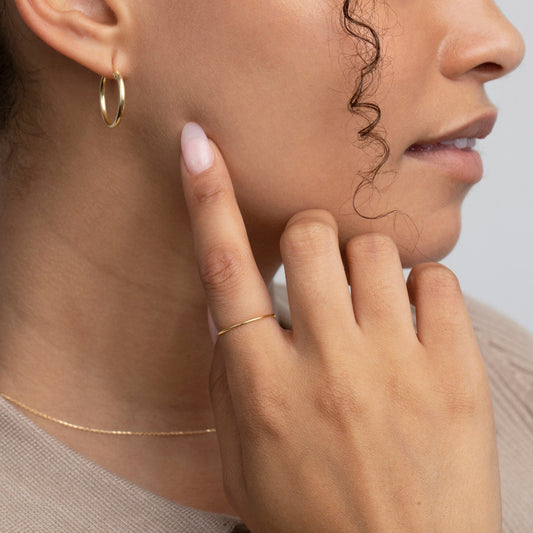 Close detail of the Minimal Band Ring in 18K Gold Vermeil. Hypoallergenic, no green marks, premium handmade jewelry.