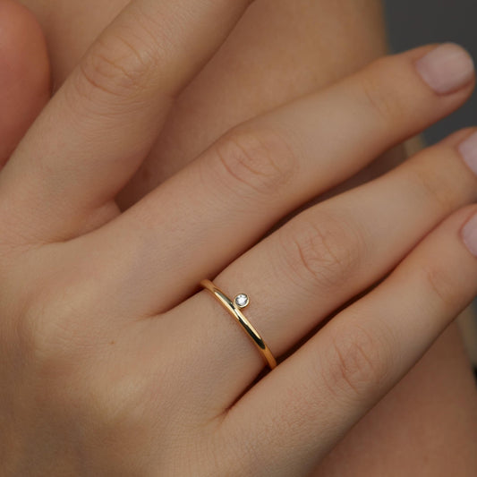 Close detail of the Minimalist CZ Diamond Stackable Ring in 18K Gold Vermeil with CZ Diamond. Hypoallergenic, no green.