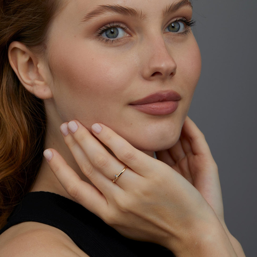 The Minimalist CZ Diamond Stackable Ring styled in 18K Gold Vermeil — elegant everyday jewelry. Tarnish-resistant.