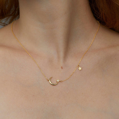 Close detail of the Moon and Star Necklace in 18K Gold Vermeil. Hypoallergenic, no green marks, premium handmade jewelry.