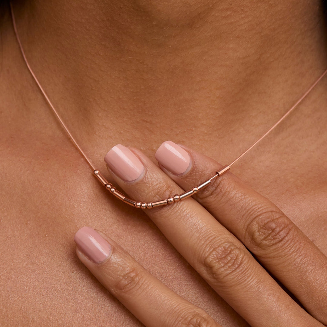 Macro detail of the Morse Code Necklace showcasing craftsmanship in 18K Gold Vermeil. Tarnish-resistant, handmade.
