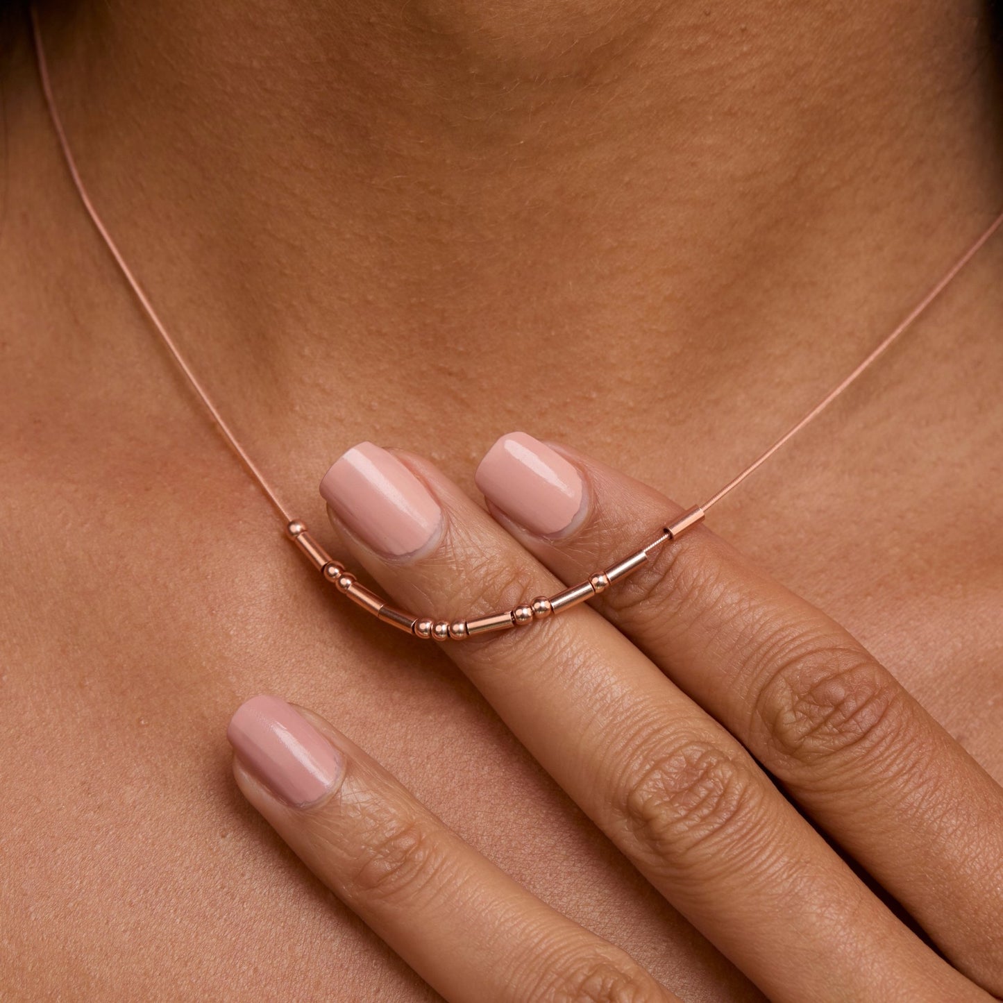 Macro detail of the Morse Code Necklace showcasing craftsmanship in 18K Gold Vermeil. Tarnish-resistant, handmade.