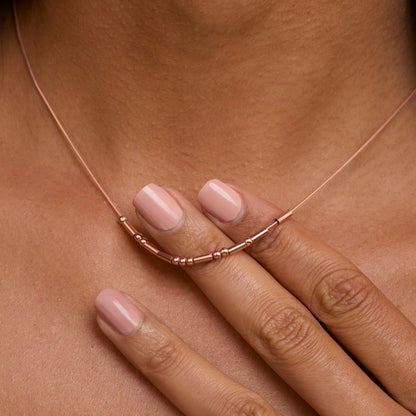 Macro detail of the Morse Code Necklace showcasing craftsmanship in 18K Gold Vermeil. Tarnish-resistant, handmade.