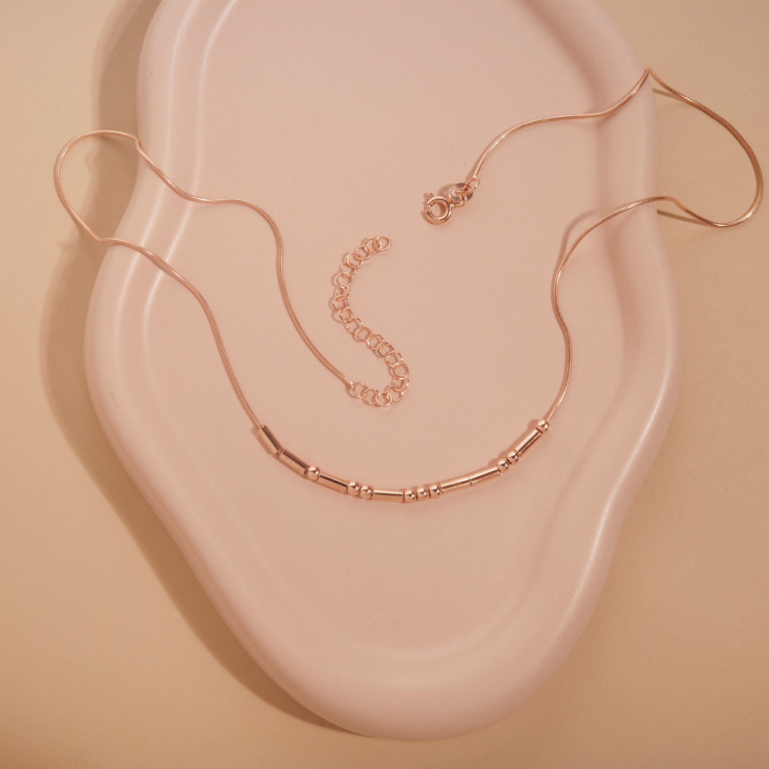 Morse Code Necklace styled with complementary pieces in 18K Gold Vermeil. Hypoallergenic, no green marks, layered looks.
