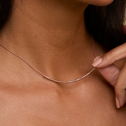 The Morse Code Necklace worn in 18K Gold Vermeil — refined accessory for women. Safe for sensitive skin.