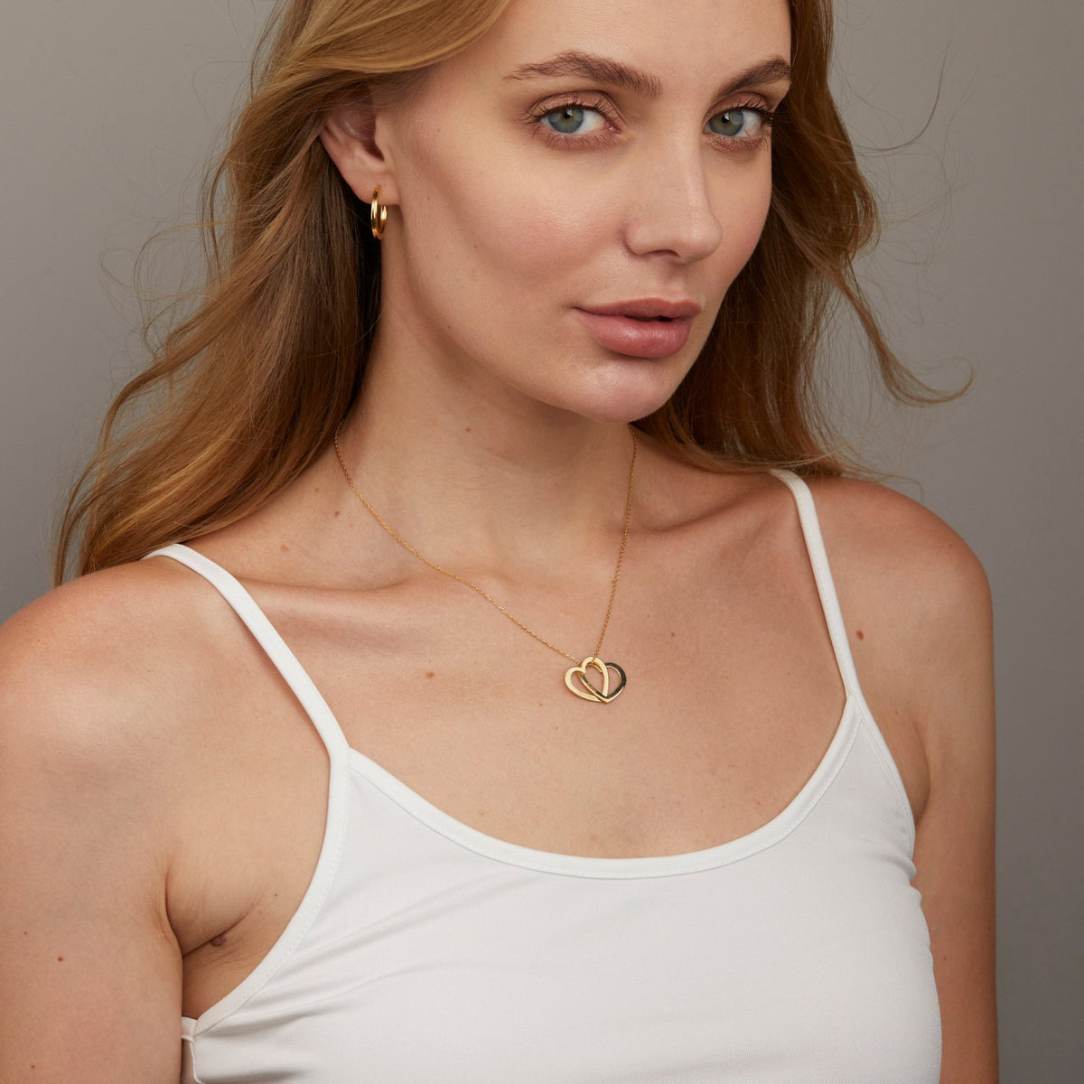 Multi-Heart Name Necklace as a thoughtful birthday gift in 18K Gold Vermeil. Hypoallergenic, no green marks.