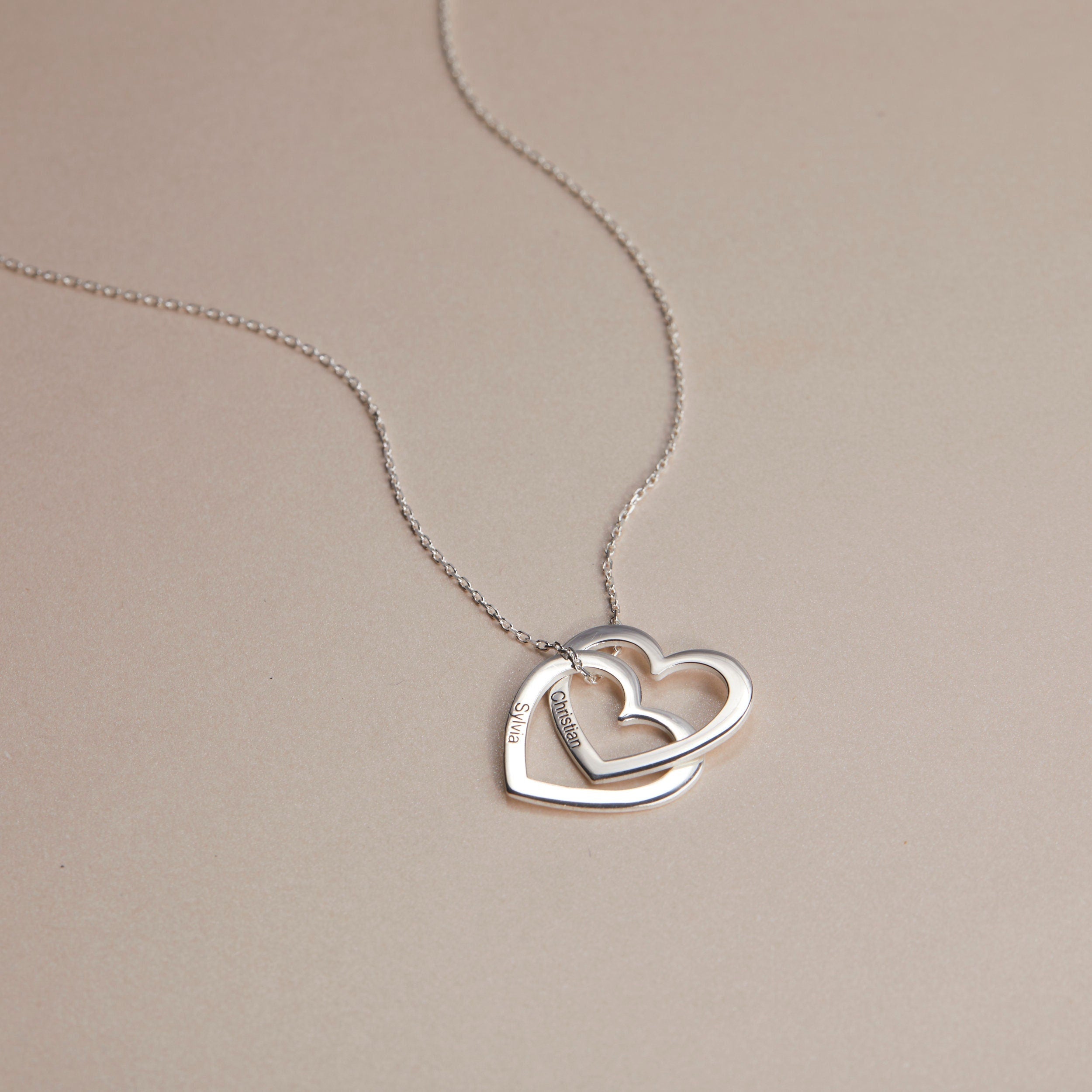 The Multi-Heart Name Necklace as a mother's day gift in 18K Gold Vermeil. Safe for sensitive skin, made for keeping.