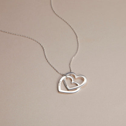 The Multi-Heart Name Necklace as a mother's day gift in 18K Gold Vermeil. Safe for sensitive skin, made for keeping.