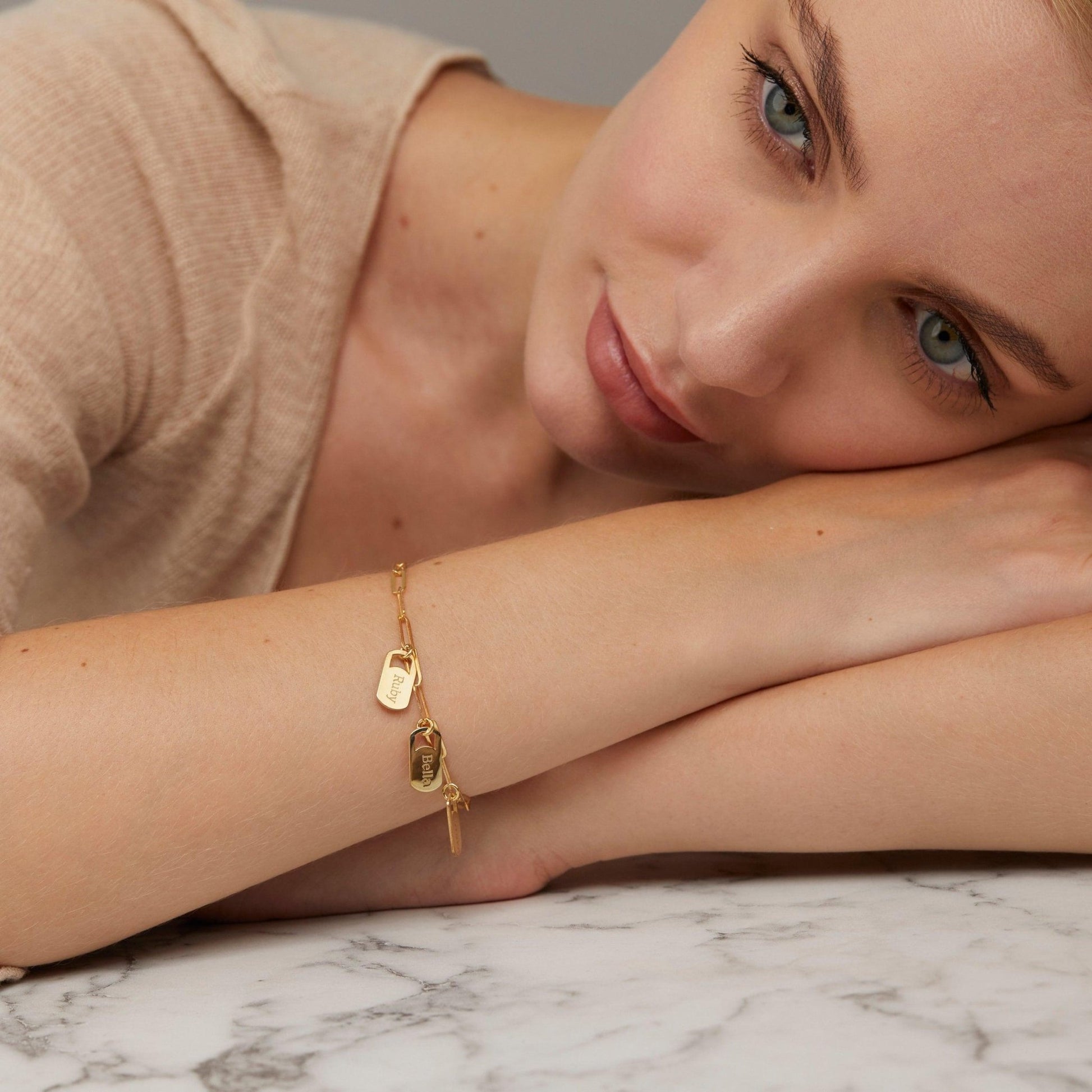 The Multiple Name Tag Bracelet styled in 18K Gold Vermeil — elegant everyday jewelry. Hypoallergenic, no green marks.