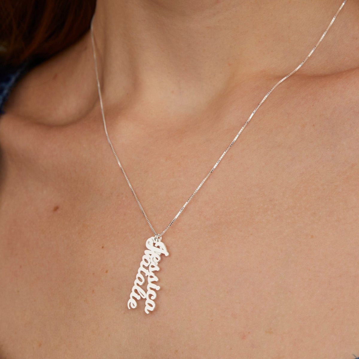 Close detail of the Multiple Vertical Name Necklace in 18K Gold Vermeil. Safe for sensitive skin, premium handmade jewelry.