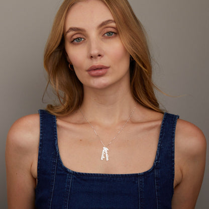 The Multiple Vertical Name Necklace as a mother's day gift in 18K Gold Vermeil. Safe for sensitive skin, made for keeping.
