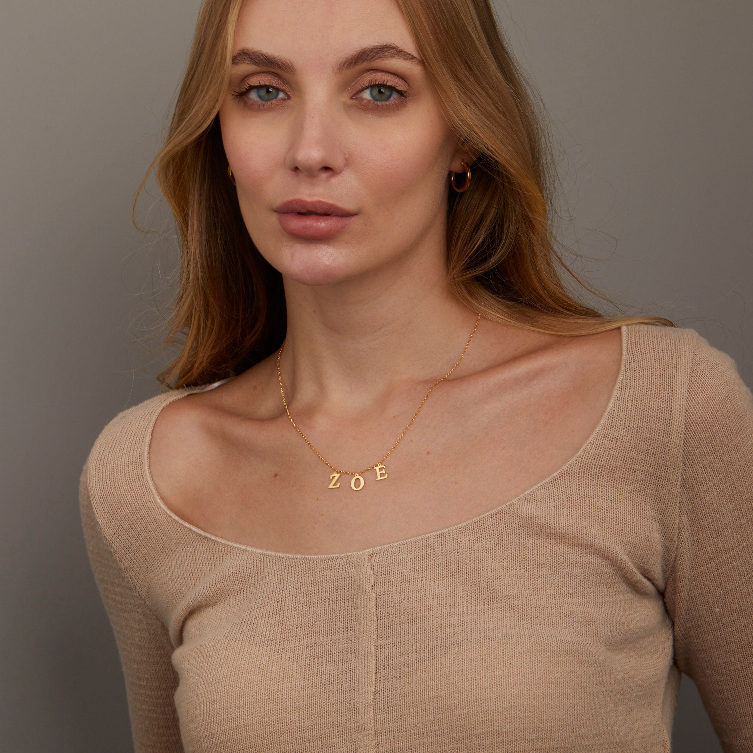 Close detail of the Name Necklace in 18K Gold Vermeil. Safe for sensitive skin, premium handmade jewelry.