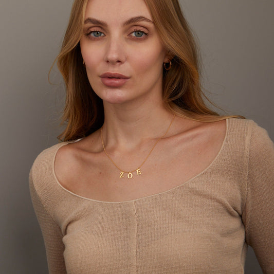 Close detail of the Name Necklace in 18K Gold Vermeil. Safe for sensitive skin, premium handmade jewelry.