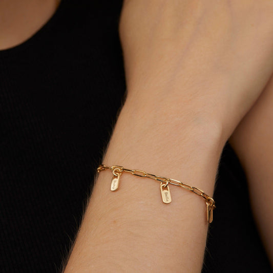 Close detail of the Name Tag Bracelet with Paperclip Chain in 18K Gold Vermeil. Safe for sensitive skin, premium handmade.