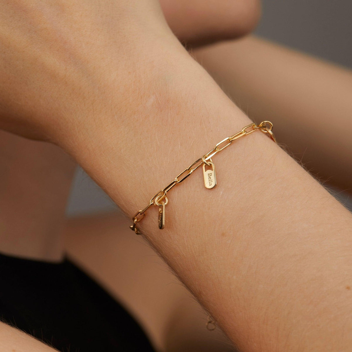 Macro detail of the Name Tag Bracelet with Paperclip Chain showcasing craftsmanship in 18K Gold Vermeil. Tarnish-resistant.