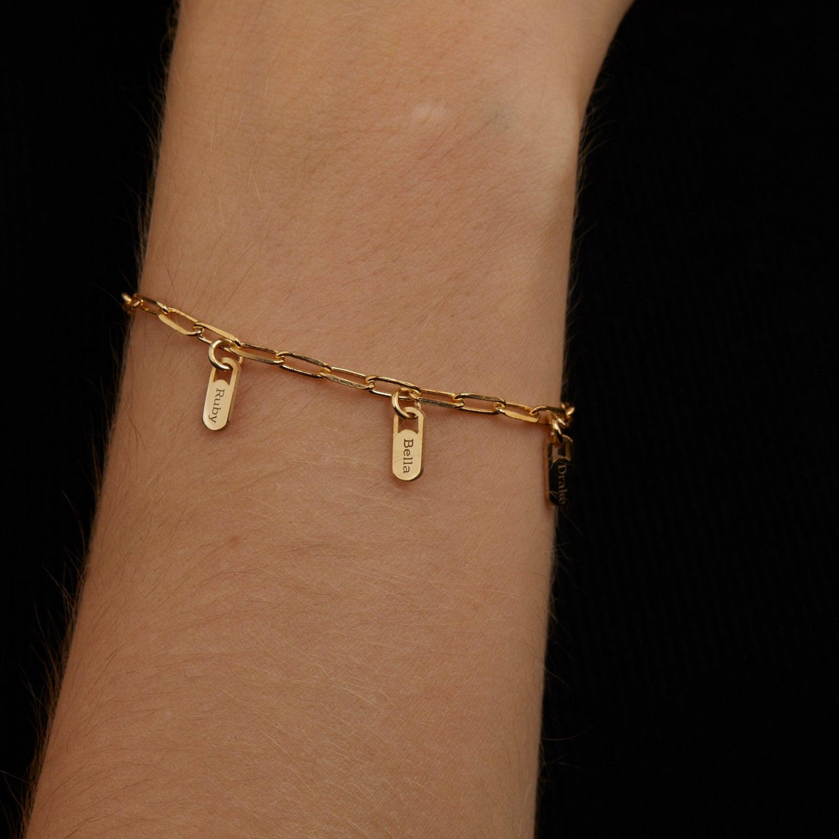 The Name Tag Bracelet with Paperclip Chain worn in 18K Gold Vermeil — refined accessory for women. Safe for sensitive skin.
