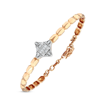 Three-quarter view of the natural diamond baguette star bracelet: white-gold star, faceted rose-gold links and lobster clasp