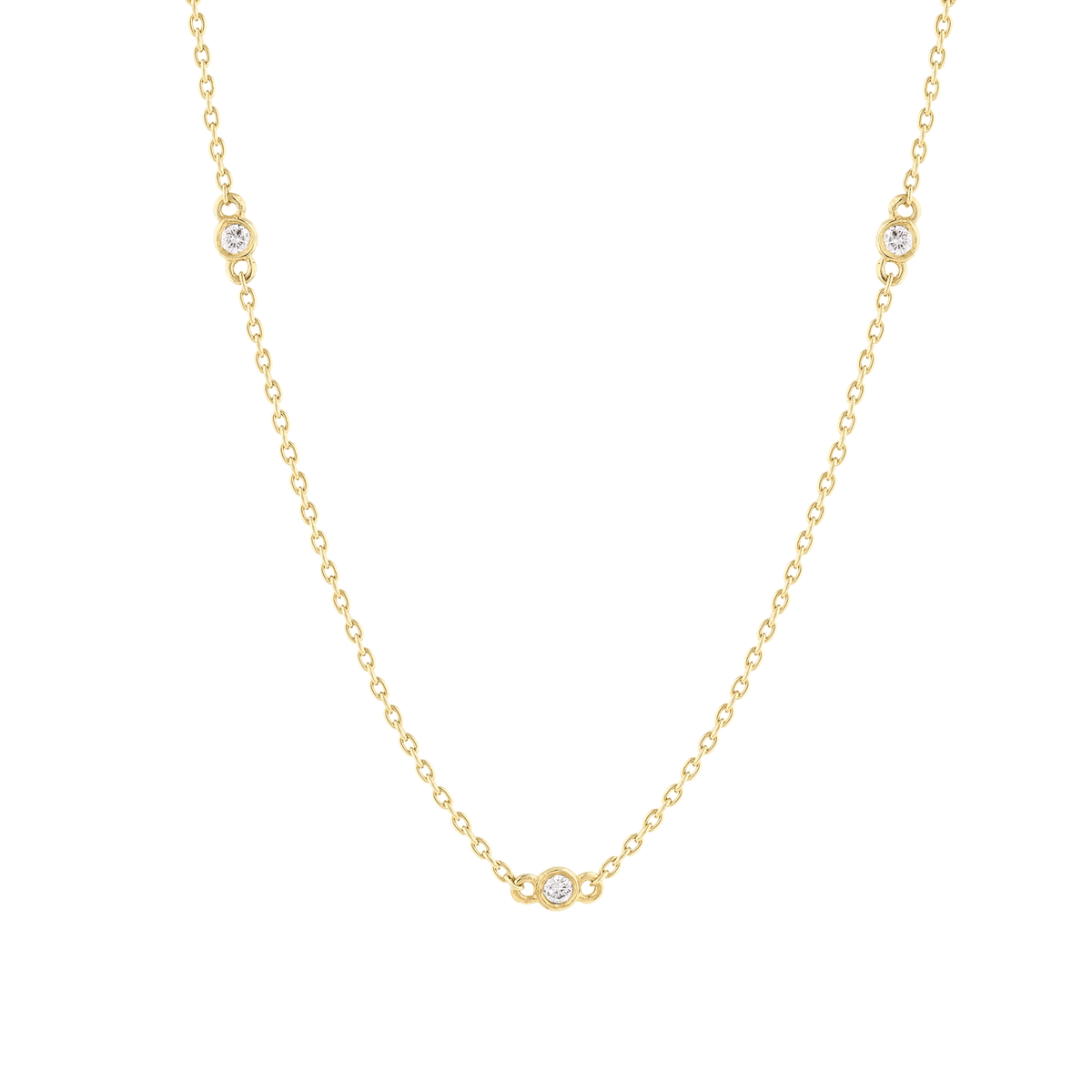 Close-up of the bezel-set natural diamond stations on the 14K yellow gold cable chain