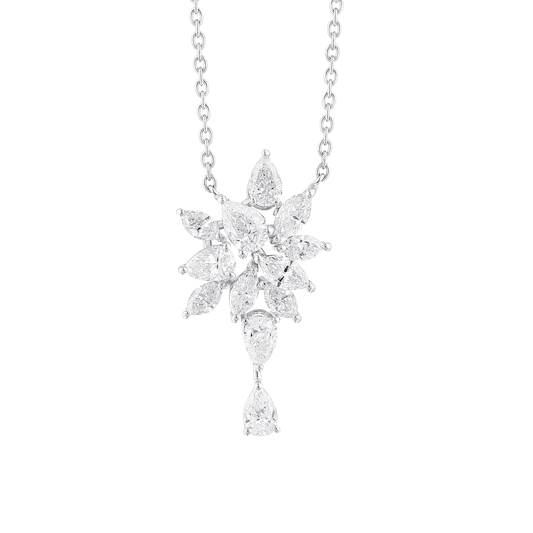 Close-up of the pear and marquise natural diamond cluster with its pear drop in 18K white gold