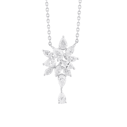Close-up of the pear and marquise natural diamond cluster with its pear drop in 18K white gold