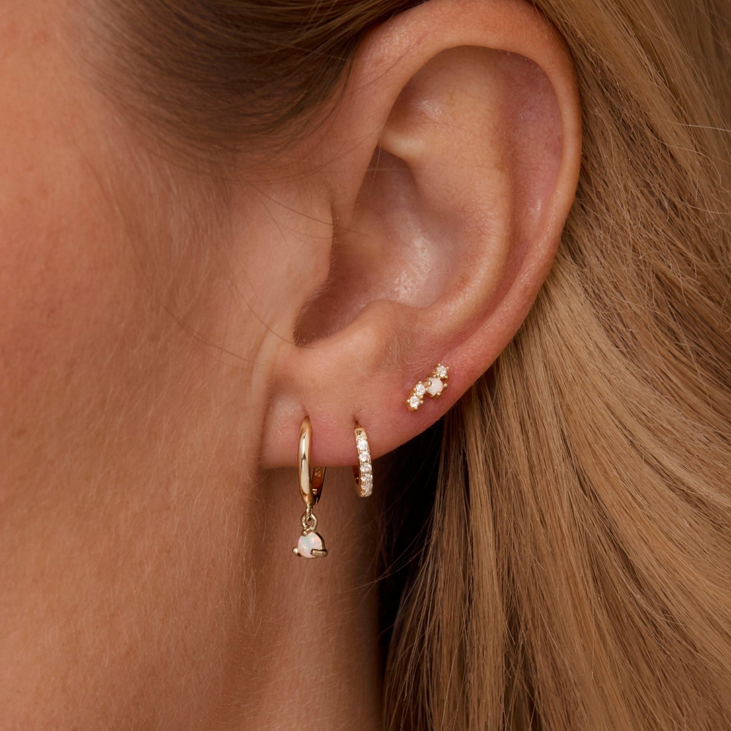 Macro detail of the Opal Earring Set: Opal set in 18K Gold Vermeil. No green marks, handmade jewelry.
