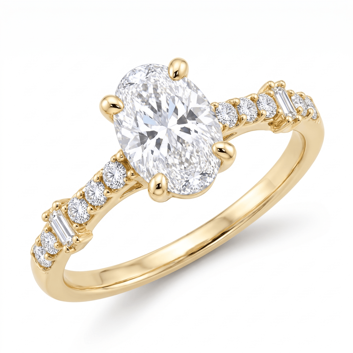 Oval solitaire ring in 14K solid gold with an oval-cut CZ and round and baguette accents