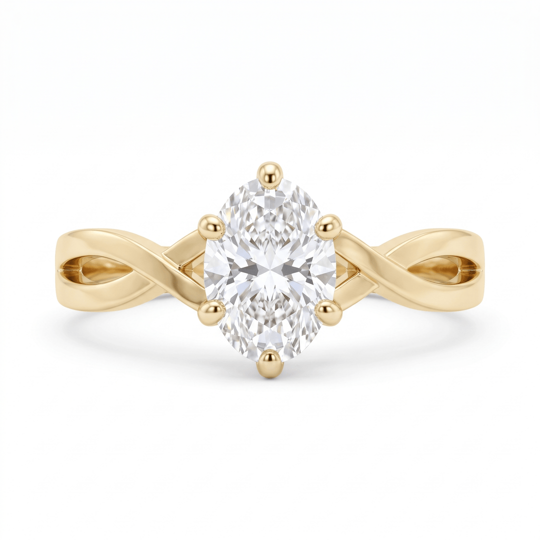 Top view of the oval-cut CZ in six prongs on the 14K solid gold twist band