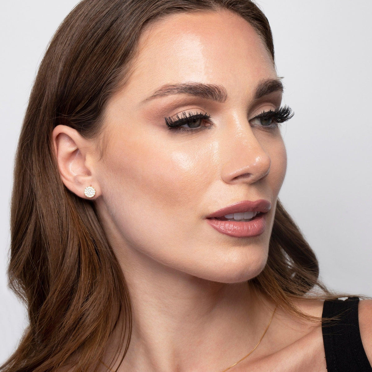 The Pavé Diamond Small Stud Earrings styled in 18K Gold Vermeil — elegant everyday jewelry. Hypoallergenic for sensitive.