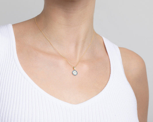 Close detail of the Pavé Evil Eye Necklace in 18K Gold Vermeil with CZ Diamond. Hypoallergenic, no green marks, premium.