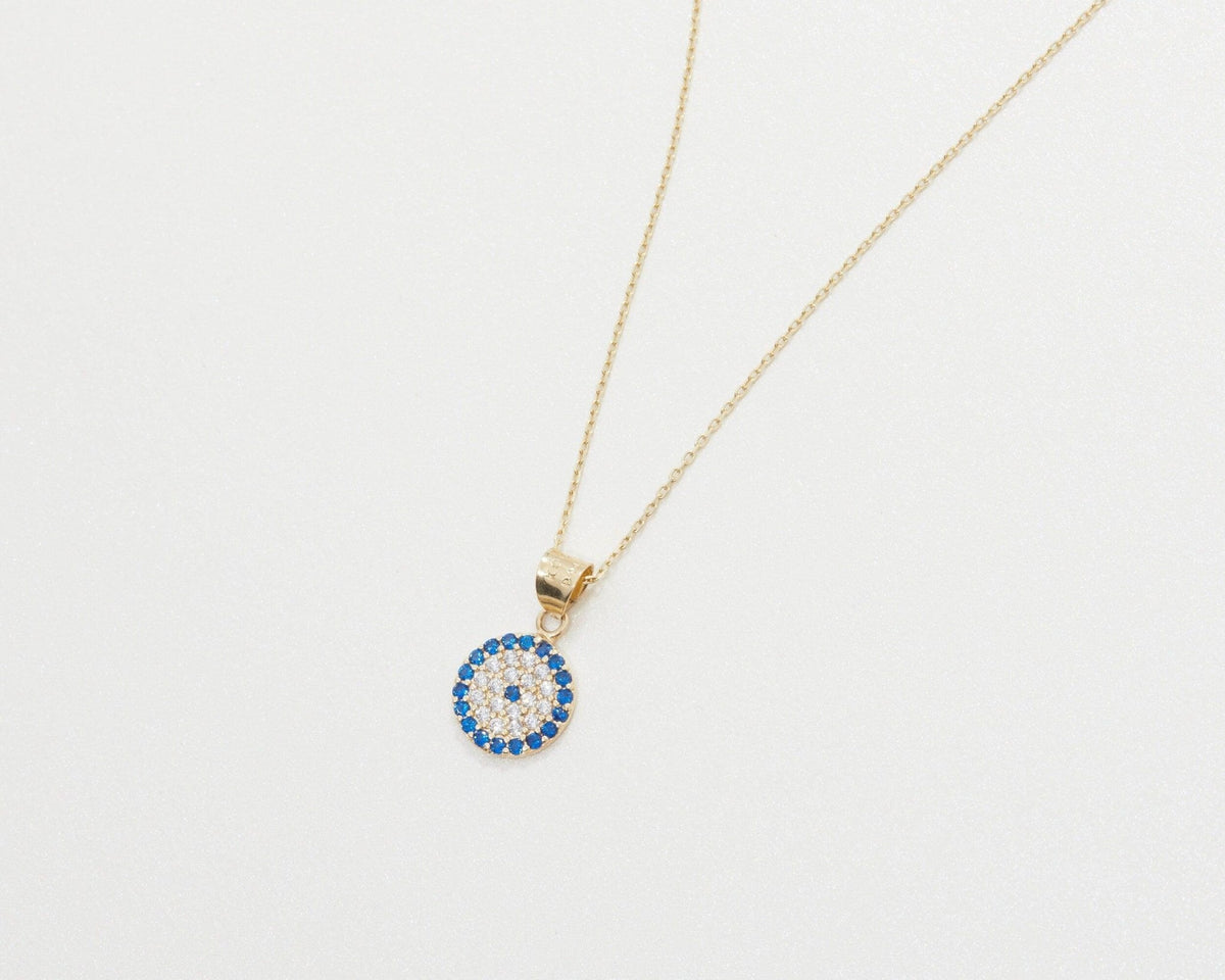 The Pavé Evil Eye Necklace as a graduation gift in 18K Gold Vermeil. Tarnish-resistant, made for keeping.