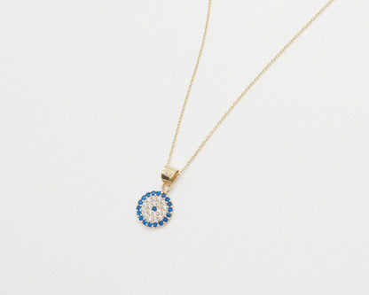 The Pavé Evil Eye Necklace as a graduation gift in 18K Gold Vermeil. Tarnish-resistant, made for keeping.