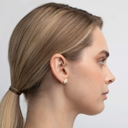 Close detail of the Pavé Flower Stud Earrings in 18K Gold Vermeil with CZ Diamond. Tarnish-resistant, premium handmade.