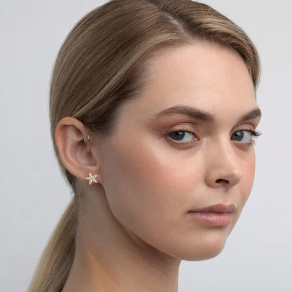 The Pavé Flower Stud Earrings styled in 18K Gold Vermeil — elegant everyday jewelry. Hypoallergenic for sensitive ears.