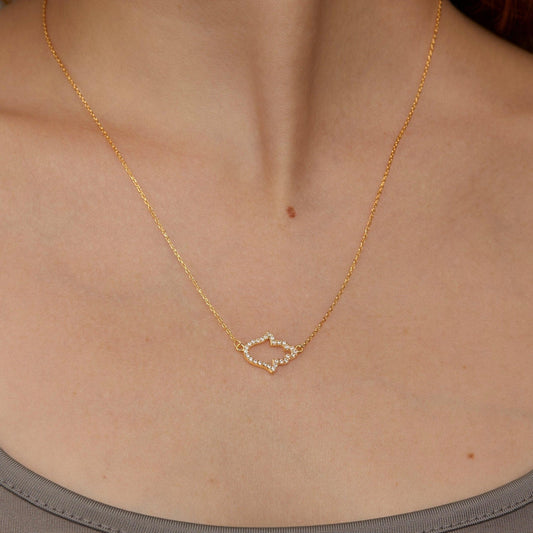 Close detail of the Pavé Hamsa Hand Necklace in 18K Gold Vermeil with CZ Diamond. Hypoallergenic, no green marks, premium.