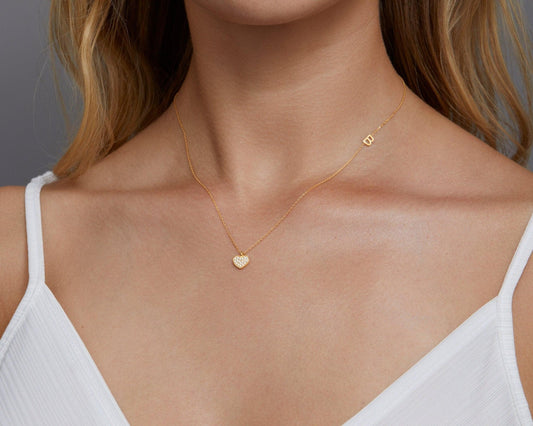 Close detail of the Pavé Heart Initial Necklace in 18K Gold Vermeil with CZ Diamond. Safe for sensitive skin, premium.