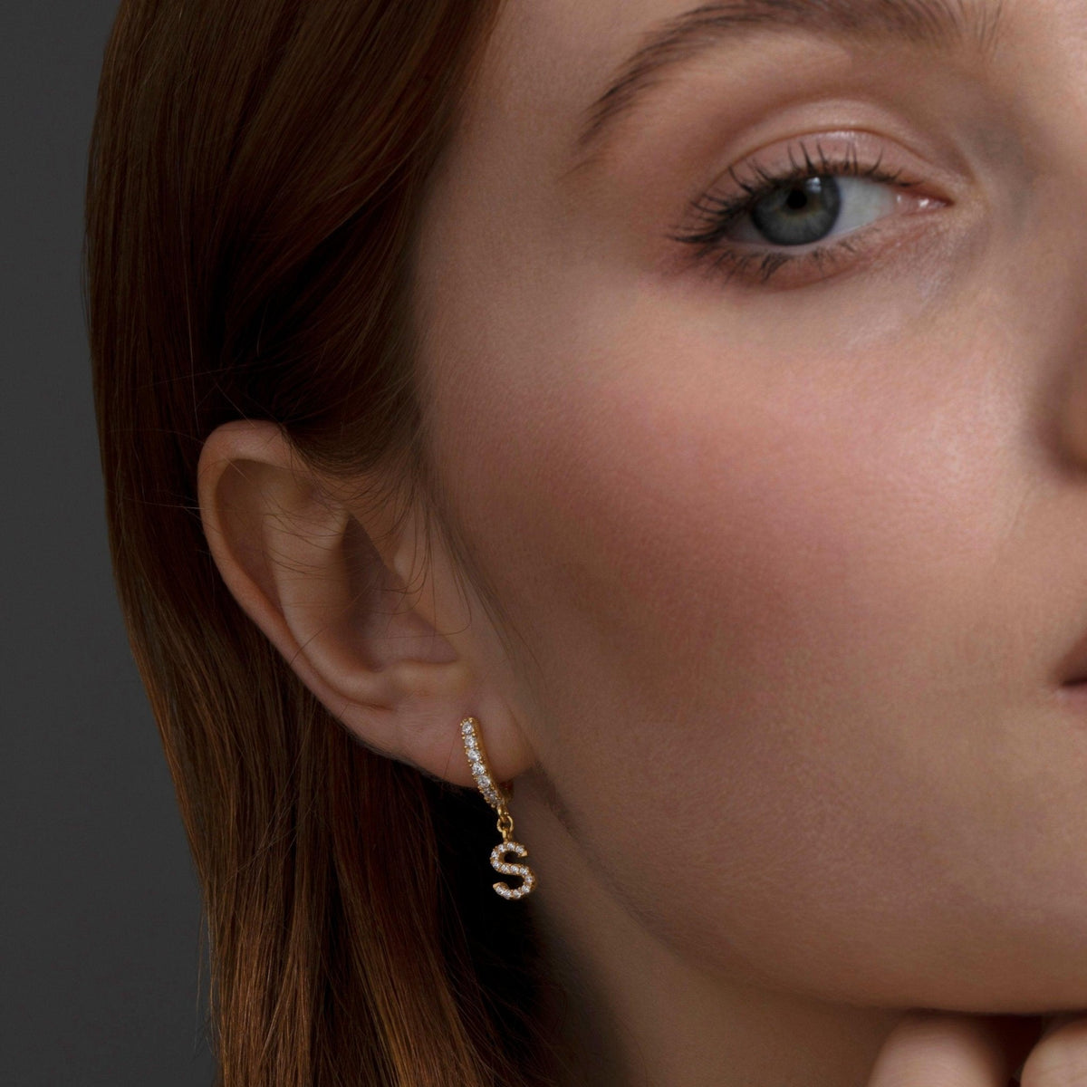 Close detail of the Pavé Initial Letter Earring in 18K Gold Vermeil with CZ Diamond. Tarnish-resistant, premium handmade.