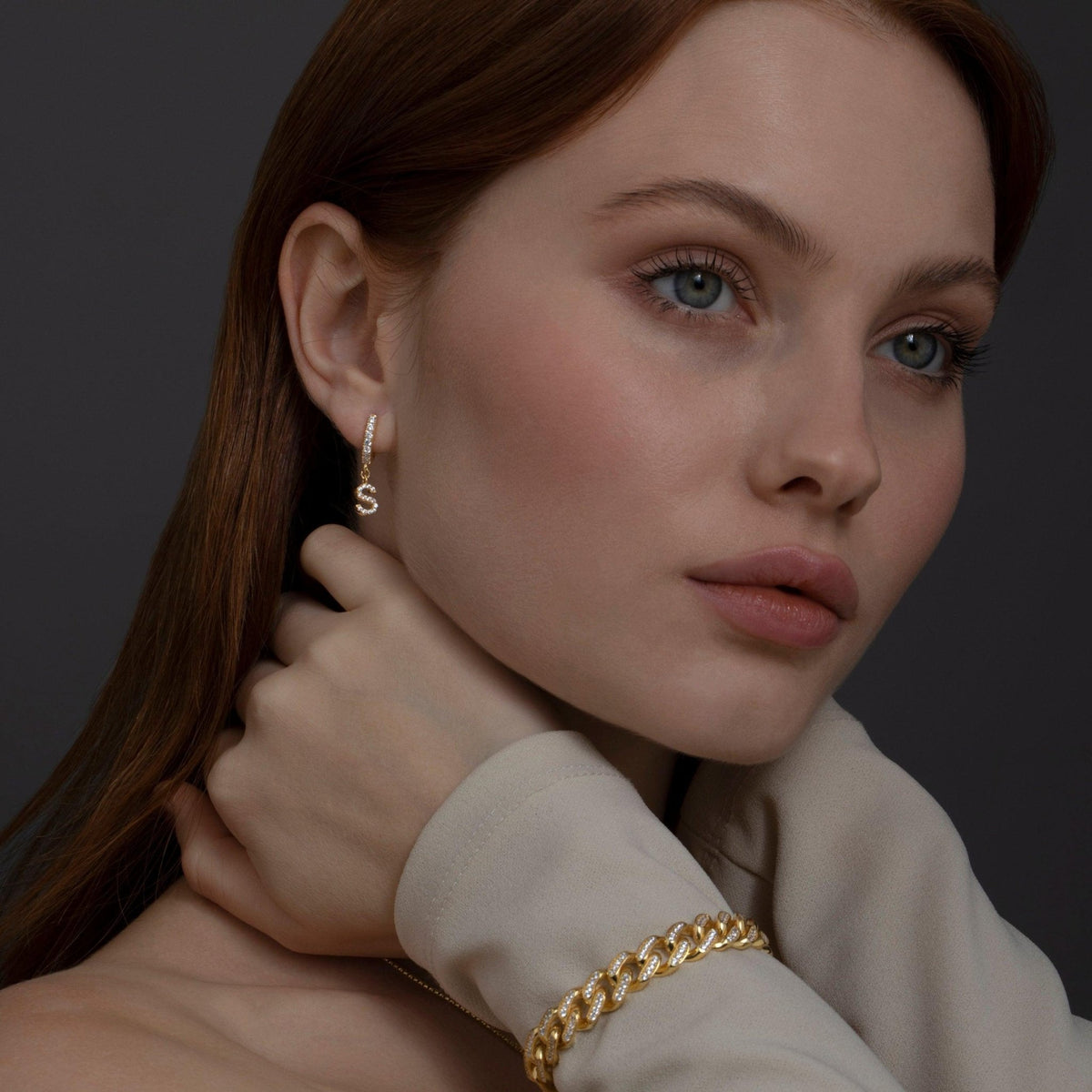 The Pavé Initial Letter Earring styled in 18K Gold Vermeil — elegant everyday jewelry. Hypoallergenic for sensitive ears.