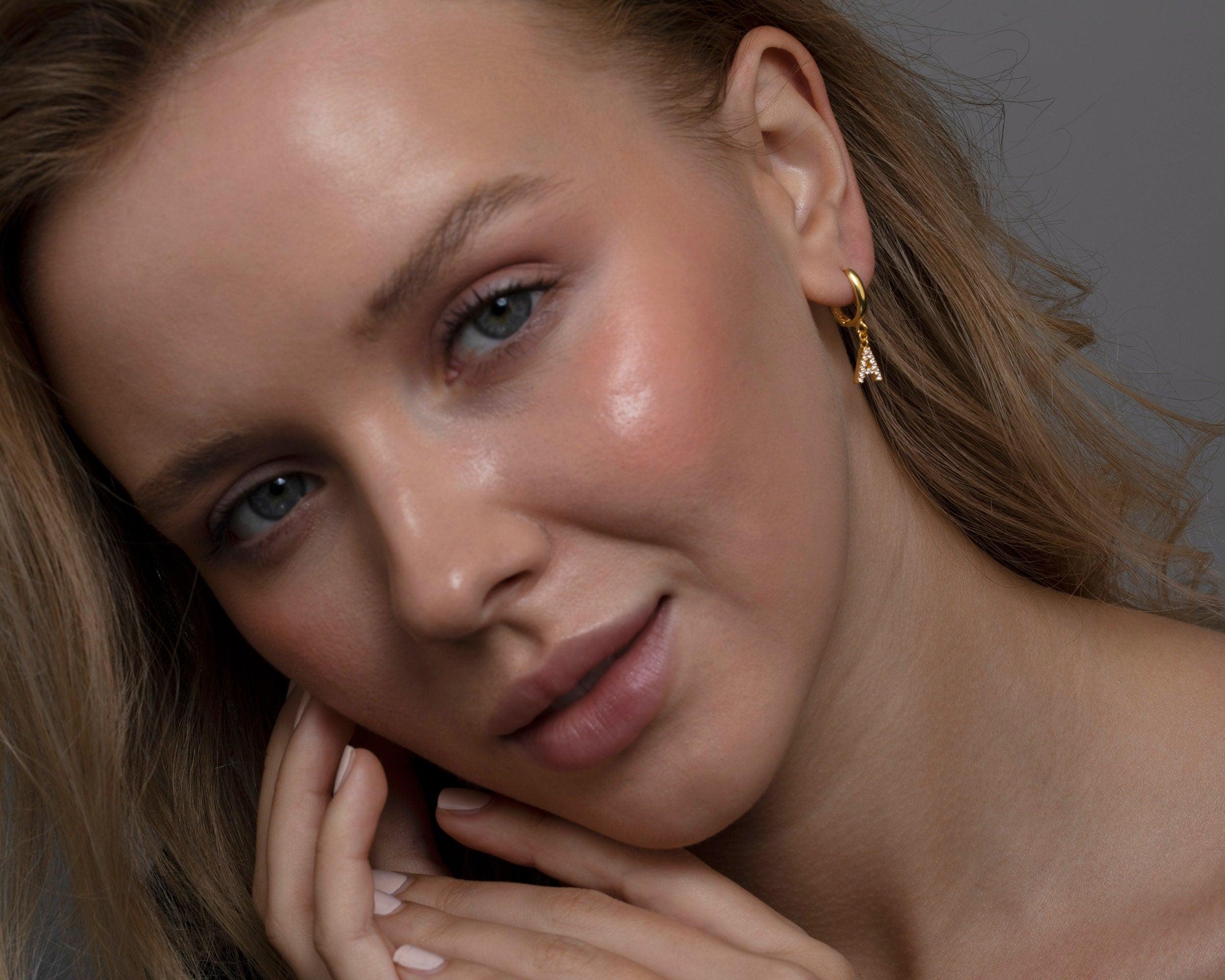 The Pavé Initials Letter Earrings worn in 18K Gold Vermeil — refined accessory for women. Tarnish-resistant.