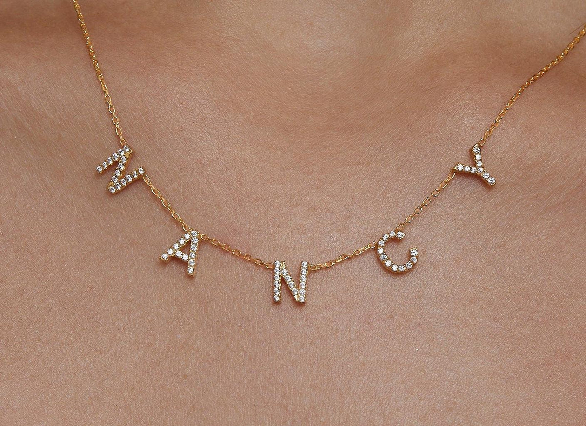 The Pavé Initials Necklace styled in 18K Gold Vermeil — elegant everyday jewelry. Hypoallergenic, no green marks.