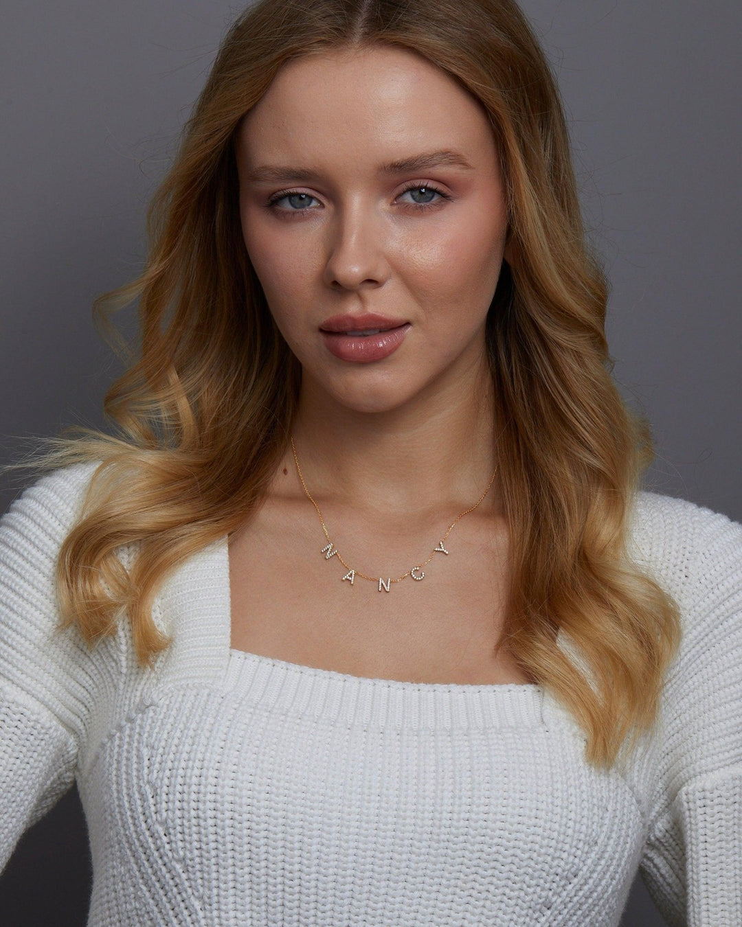 The Pavé Initials Necklace worn in 18K Gold Vermeil — refined accessory for women. Safe for sensitive skin.