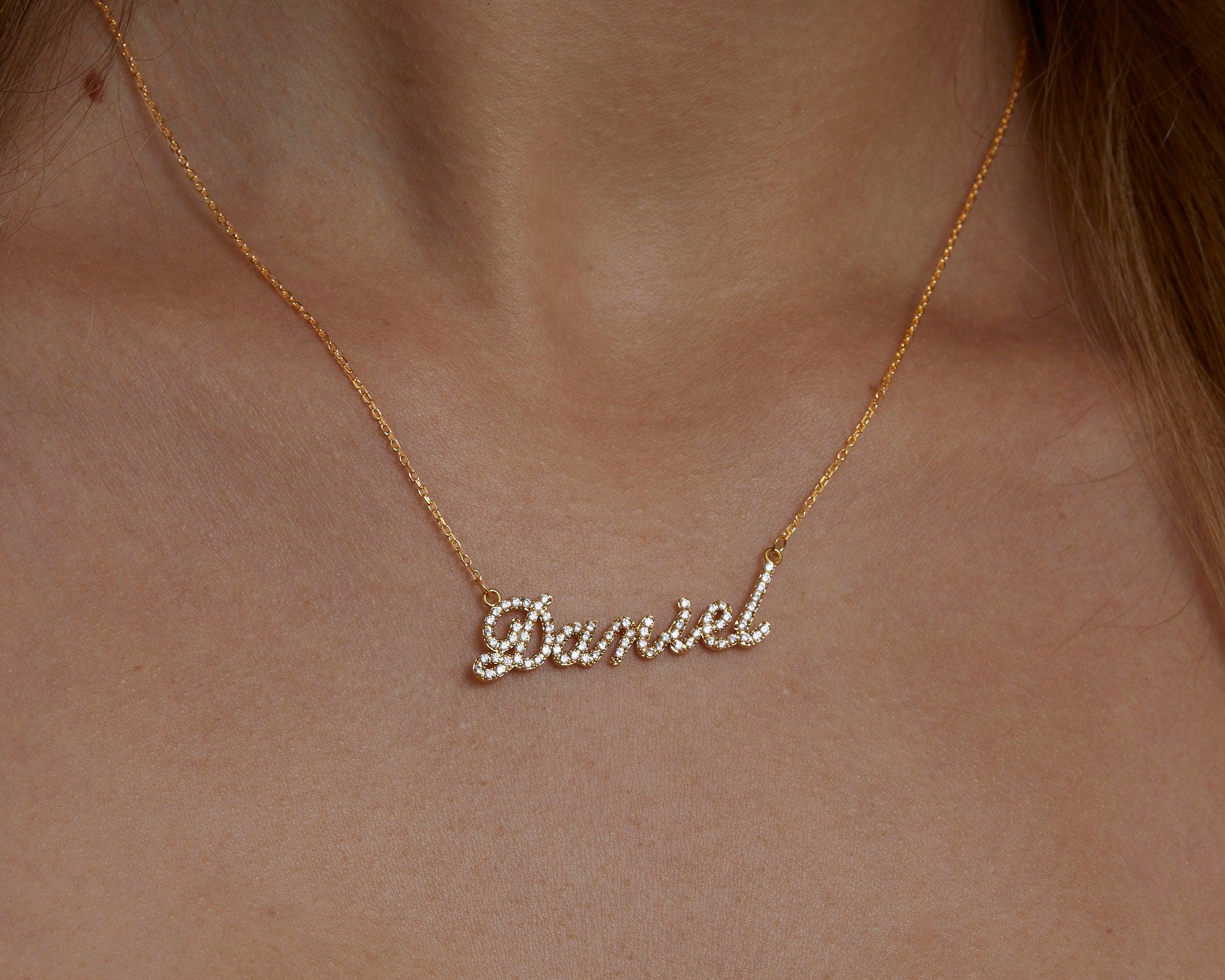 Macro detail of the Pavé Name Necklace: CZ Diamond set in 18K Gold Vermeil. Tarnish-resistant, handmade jewelry.