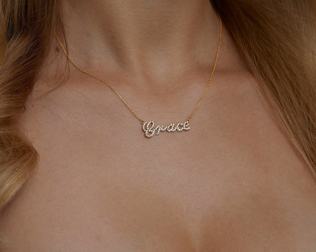 The Pavé Name Necklace styled in 18K Gold Vermeil — elegant everyday jewelry. Hypoallergenic, no green marks.