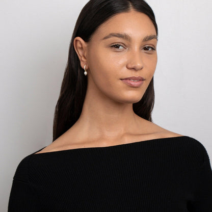 The Dainty Pearl Hoop Earrings as a wedding gift in Gold-Plated Steel. Tarnish-resistant, made for keeping.