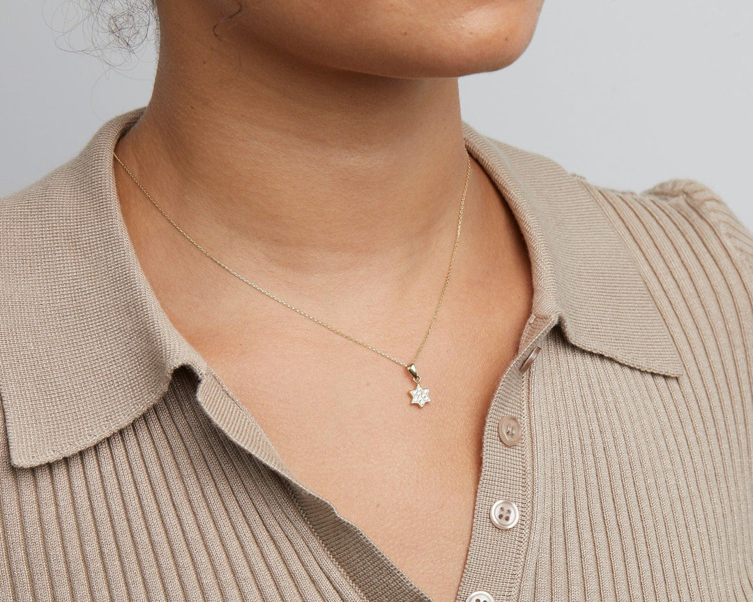 Close detail of the Pavé Star of David Necklace in 18K Gold Vermeil with CZ Diamond. Safe for sensitive skin, premium.