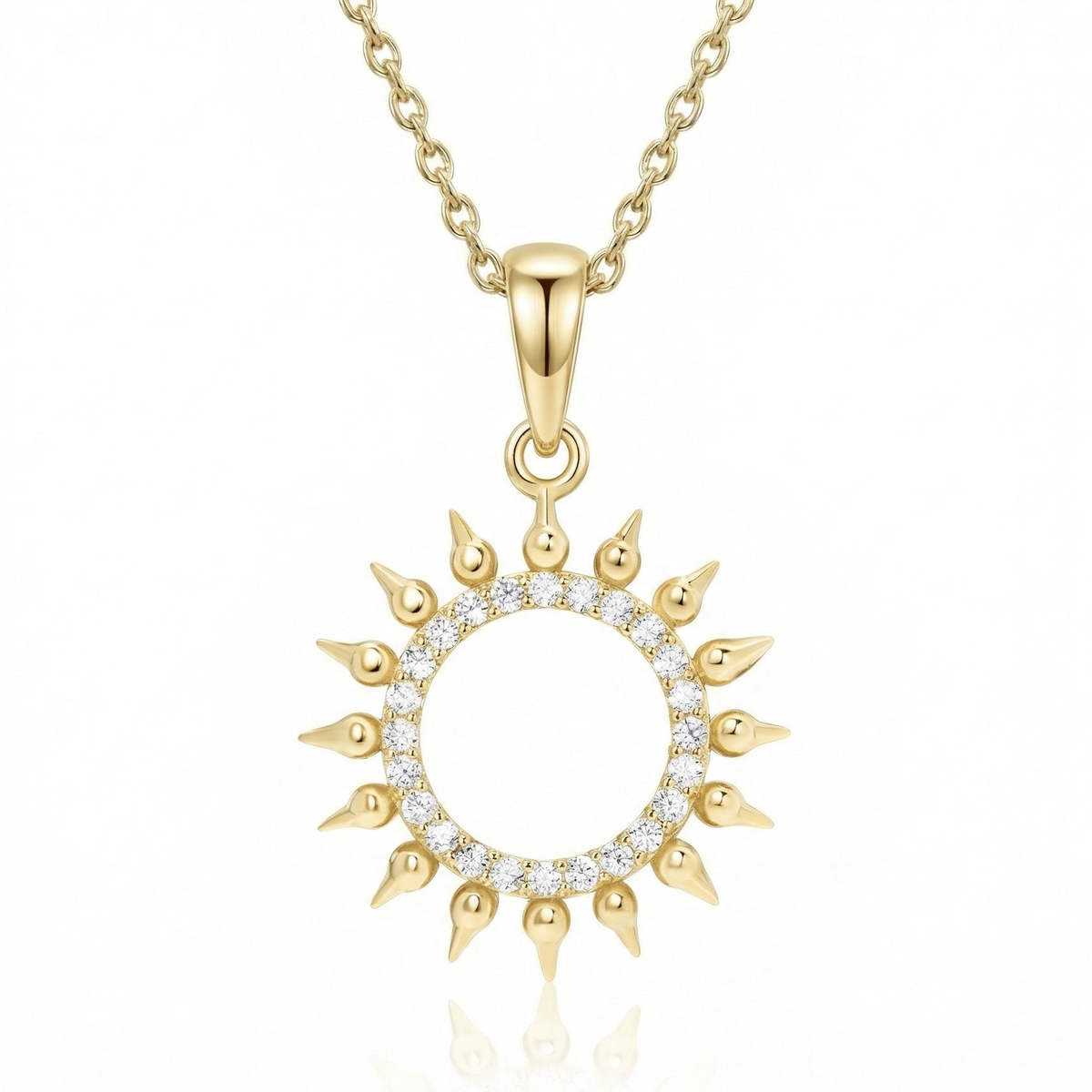 Pavé Sun Necklace in 14K solid gold: an open ring of clear CZ stones with pointed gold rays, on a gold chain.