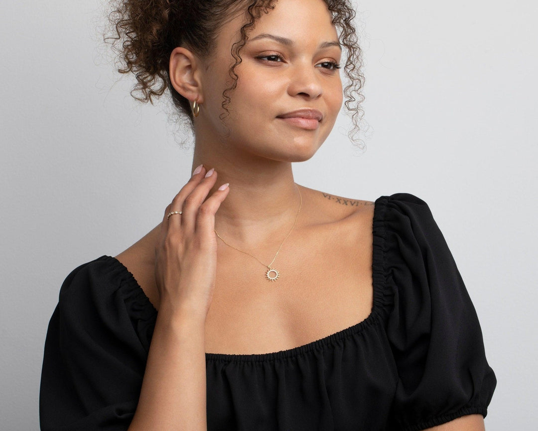 The Pavé Sun Necklace styled in 18K Gold Vermeil — elegant everyday jewelry. Hypoallergenic, no green marks.